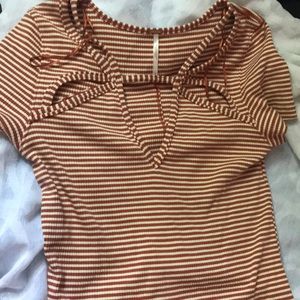 White and orange striped shirt